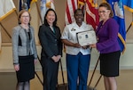 The 2017 Military Woman of the Year was Army Lt. Col. Clarisse Scott, military deputy director of Land Supplier Operations at DLA Land and Maritime. She received the award during an annual Women's History Month Luncheon Mar. 22 at Defense Supply Center Columbus. Pictured with Scott is (from left) Deborah Haven, Land and Maritime deputy director of Maritime Customer Operations; Jenny Yang, U.S. EEO commissioner; and Rebecca Beck, deputy site director for DFAS Columbus.