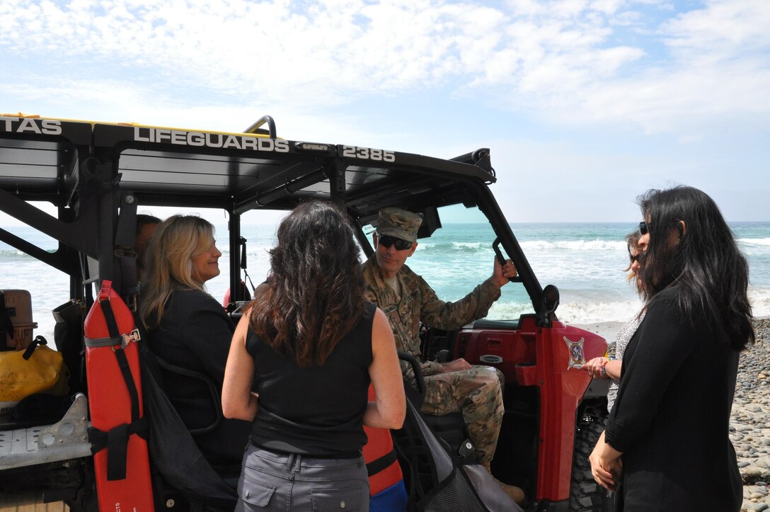 Col. Peter Helmlinger, commander of the South Pacific Division, discusses shoreline protection measures with Leslie Meyerhoff (center), from Summit Environmental Group, and Susie Ming (right), the Corps’ manager for the project, during a March 15 visit to Encinitas.