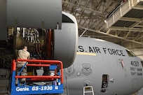 Staff Sgt. Lewis Cole, 514th Maintenance Squadron propulsion flight air reserve technician, performs routine work on a C-17 Globemaster III at Joint Base McGuire-Dix-Lakehurst, March 23, 2017. Every 120 days a different aircraft enters the 305th Maintenance Squadron's shop for a piece-by-piece inspection.  