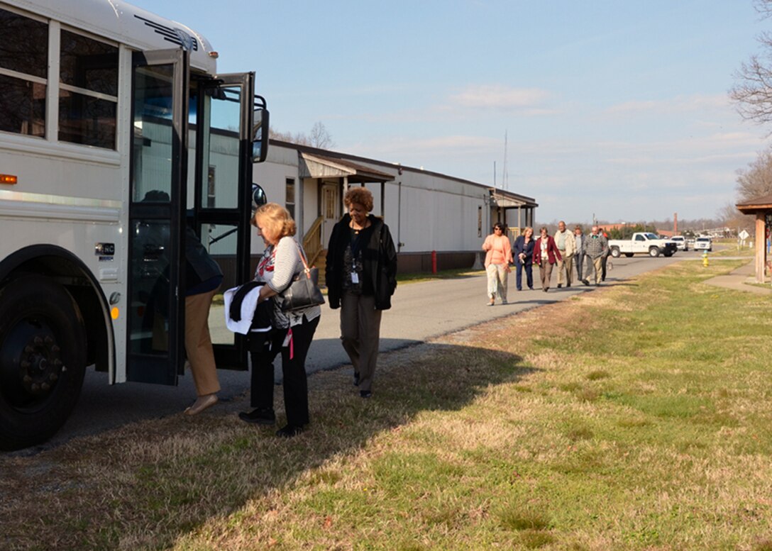 Defense Supply Center Richmond, Virginia, employees load onto a bus to move to secure area during the Virginia Department of Emergency Management’s 2017 Statewide Tornado Drill March 21, 2017.  