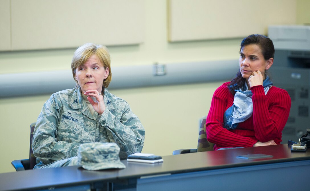 Col. Sharon Bannister, 79th Medical Wing commander, listens as Dr. Daniel Gruber, 779th Surgical Operations Squadron female pelvic medicine and reconstructive surgery director, gives a lecture on Urogynecology at the Smart Center on Joint Base Andrews March 24, 2017. The lecture, encompassing primary care, physical therapy and surgical care, was available to all 79th Medical Wing providers and even qualified for a Continuing Medical Education credit. (U.S. Air Force photo by Staff Sgt. Chad C. Strohmeyer)
