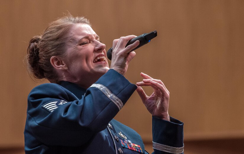 Tech. Sgt. Paige Wroble, U.S. Air Force Band Airmen of Note vocalist, sings during a Jazz Heritage Series performance in Alexandria, Va., March 23, 2017. The series began in 1990 and is broadcast to millions each year through National Public Radio, independent jazz radio stations, satellite radio services and the internet. (U.S. Air Force photo by Senior Airman Jordyn Fetter)