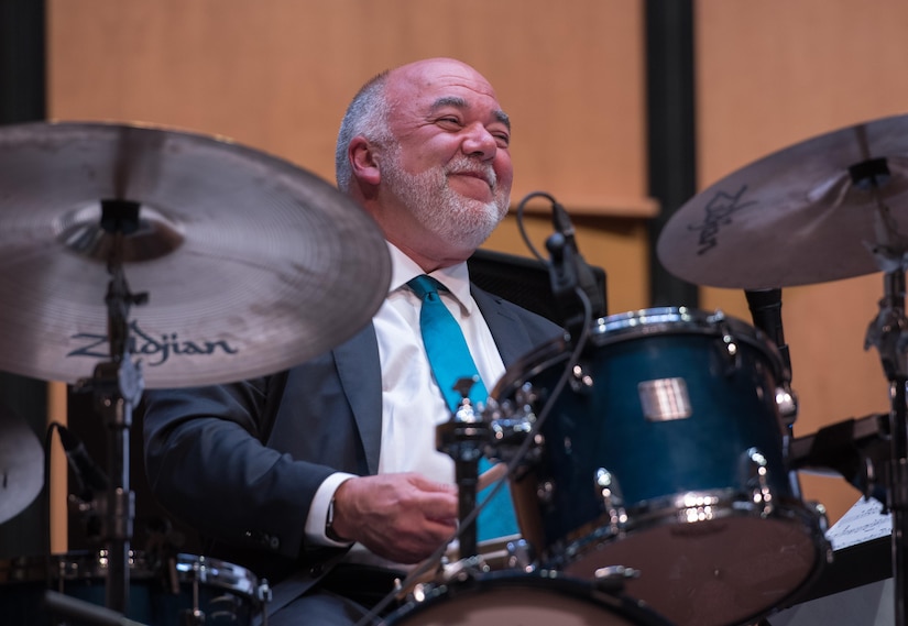 Peter Erskine, American jazz drummer, smiles after performing alongside the U.S. Air Force Band Airmen of Note at a Jazz Heritage Series concert in Alexandria, Va., March 23, 2017. Erskine is a renowned musician, having won two Grammy Awards and “Best Jazz Drummer of the Year” by Modern Drummer Magazine readers 10 times. He is one of many jazz icons who have participated in the series, which began in 1990. (U.S. Air Force photo by Senior Airman Jordyn Fetter)