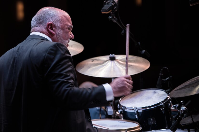 Peter Erskine, American jazz drummer, performs alongside the U.S. Air Force Band Airmen of Note during a Jazz Heritage Series concert in Alexandria, Va., March 23, 2017. Erskine is a renowned musician, having won two Grammy Awards and “Best Jazz Drummer of the Year” by Modern Drummer Magazine readers 10 times. He is one of many jazz icons who have participated in the series, which began in 1990. (U.S. Air Force photo by Senior Airman Jordyn Fetter)