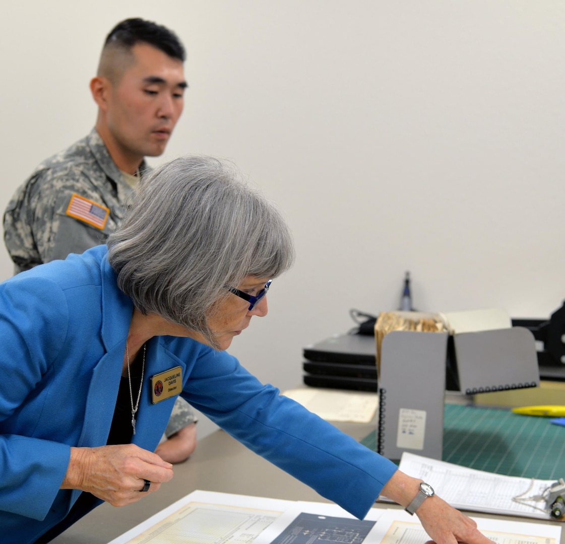 Jacqueline Davis, director of the Fort Sam Houston Museum, looks at a document containing information on a historical residence at the post in the museum’s reference library and archives. Located in the historic Quadrangle, the museum contains six rooms of exhibits, displays and artifacts on the history of Fort Sam Houston and a reference library and archives containing documents, publications, sources and approximately 10,000 photos relating to the installation’s history.