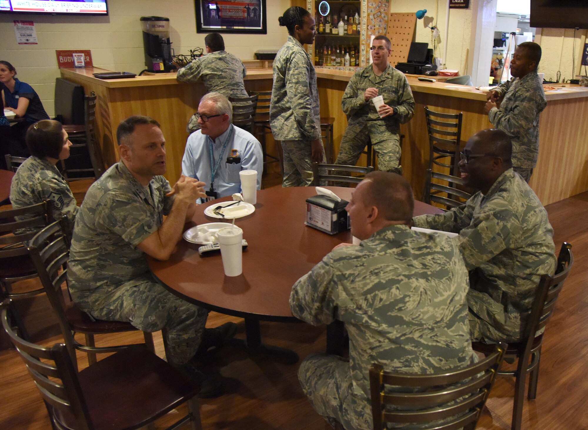 Keesler personnel gather for fellowship during a Care for the Caregiver event at Gaudé Lanes March 23, 2017, on Keesler Air Force Base, Miss. The event, hosted by the 81st Training Wing Chapel staff, was open to units who provide mental, spiritual and social care for Airmen and their families and included fellowship, bowling and food. (U.S. Air Force photo by Kemberly Groue)