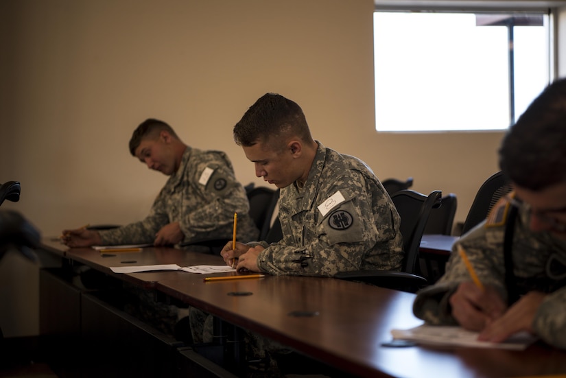 Spc. Canning takes his written test during this year’s 200th Military Police Command’s Best Warrior Competition held at Fort Hunter Liggett, Calif., March 16, 2017. Competitors test their Army aptitude by completing warfare simulations, board interviews, physical fitness tests, written exams, and Warrior tasks and battle drills. (US Army photo by Sgt. Elizabeth Taylor)