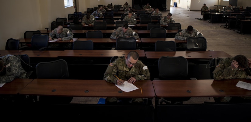 U.S. Army competitors take their written exam during this year’s 200th Military Police Command’s Best Warrior Competition held at Fort Hunter Liggett, Calif, Mar. 17, 2017. Competitors test their Army aptitude by completing warfare simulations, board interviews, physical fitness tests, written exams, and Warrior tasks and battle drills. (U.S. Army photo by Sgt. Elizabeth Taylor)