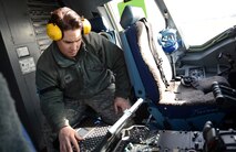 Staff Sgt. James Pomeroy, 62nd Aircraft Maintenance Squadron crew chief, reviews technical orders for turning power on in a C-17 Globemaster III aircraft March 20, 2017 at Joint Base Lewis-McChord, Wash. Crew chiefs are the first in the line responsibility to maintain aircraft and are responsible for ensuring aircraft are airworthy and ready to fly in moment’s notice. (U.S. Air Force photo/Senior Airman Jacob Jimenez) 