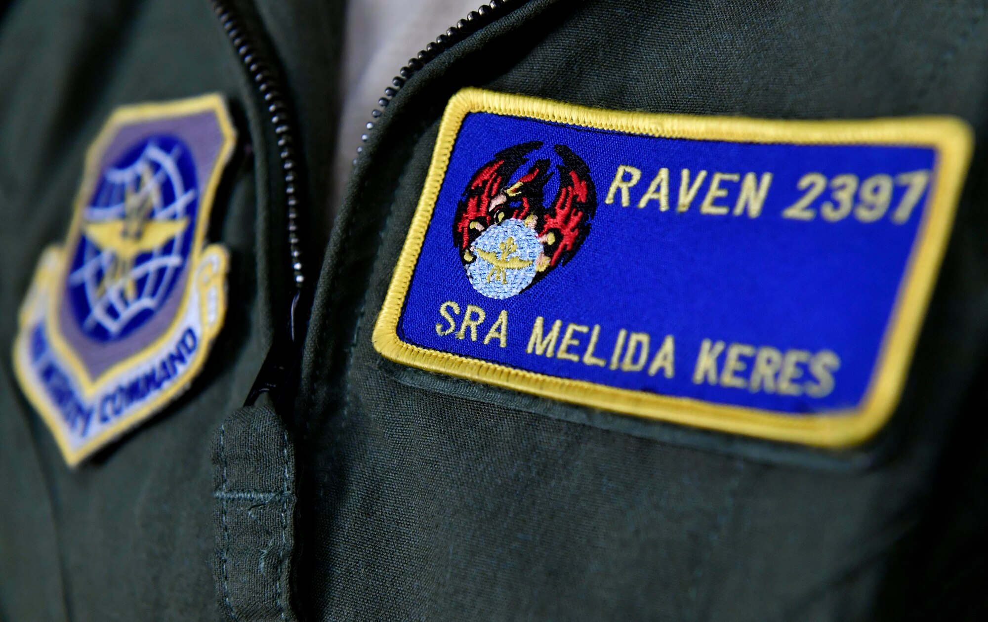 Senior Airman Melida Keres, 628th Security Forces Squadron phoenix raven, wears her raven patch, here, March 13, 2017. With five out of 32 phoenix ravens being females, Joint Base Charleston is home to more than half of the female ravens in AMC.