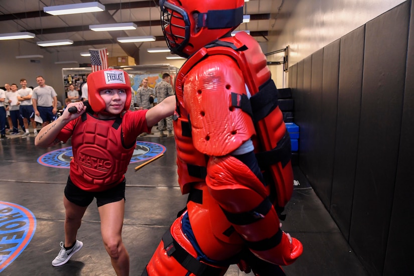 Senior Airman Melida Keres, left, 628th Security Forces Squadron phoenix raven, participates in a Red Man demonstration with Staff Sgt. Larry Blue, right, 628th SFS phoenix raven, here, March 24, 2017. With five out of 32 phoenix ravens being females, Joint Base Charleston is home to more than half of the female ravens in AMC.