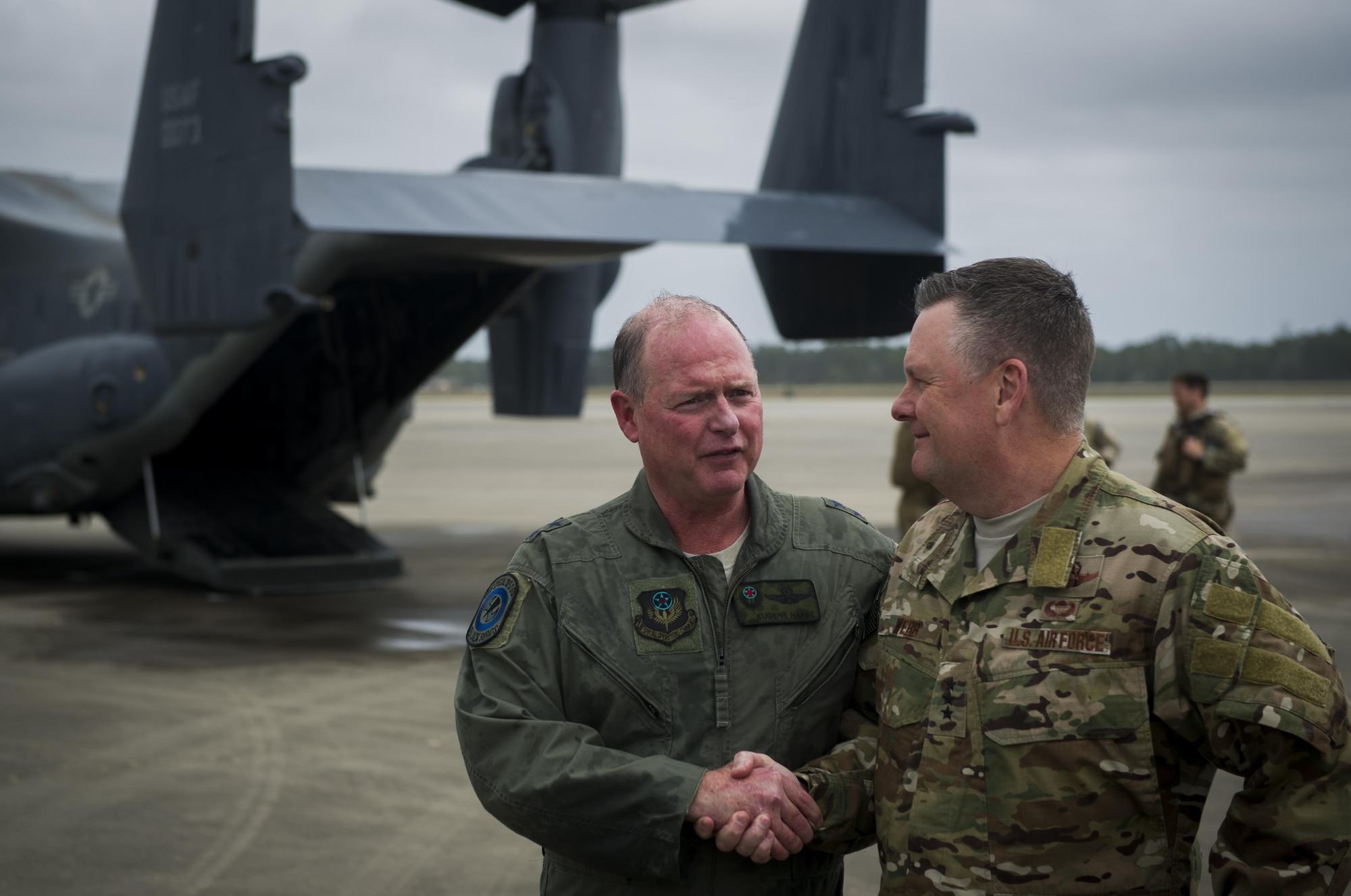 Maj. Gen. Eugene Haase, left, vice commander of Air Force Special Operations Command, is greeted by Lt. Gen. Brad Webb, commander of AFSOC, after Haase’s final flight before his retirement at Hurlburt Field, Fla., March 24, 2017. Haase has logged more than 3,500 flight hours in his career and served as the AFSOC vice commander for the past 30 months before his retirement ceremony, April 10. (U.S. Air Force photo by Airman 1st Class Joseph Pick)