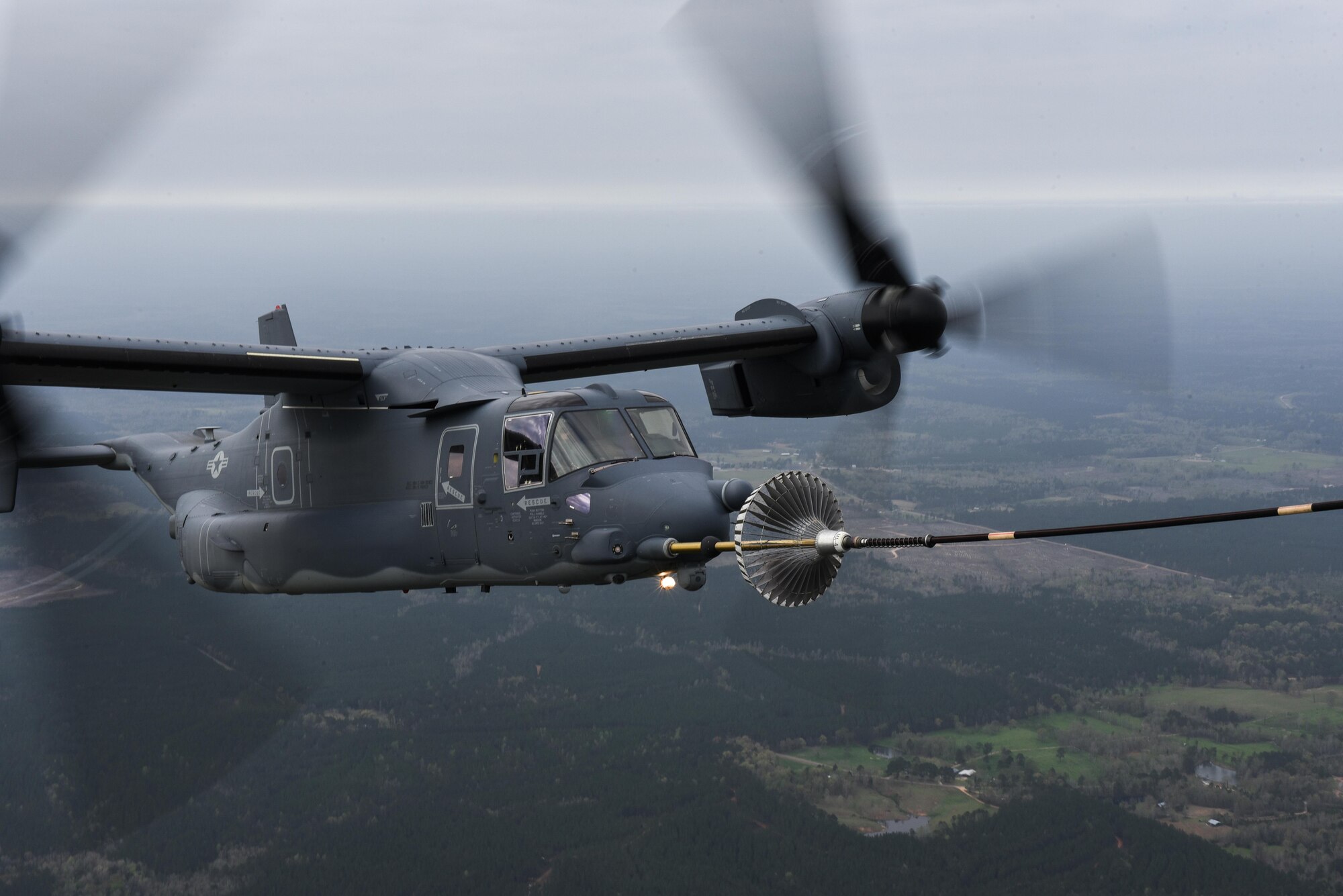 Maj. Gen. Eugene Haase, vice commander of Air Force Special Operations Command, flies a CV-22 Osprey tilt-rotor aircraft during his “Fini” flight  over Eglin Range, Fla., March 24, 2017. During his 34 years of service, Haase has flown more than 3,500 flying hours in the UH-1N twin huey helicopter, HH-60G and MH-60G Pave Hawk helicopter, MH-53 Pave Low helicopter, HC-130 Combat King, MC-130P Combat Shadow, MC-130H Combat Talon II, C-130E and CV-22. (U.S. Air Force photo by Senior Airman Jeff Parkinson)