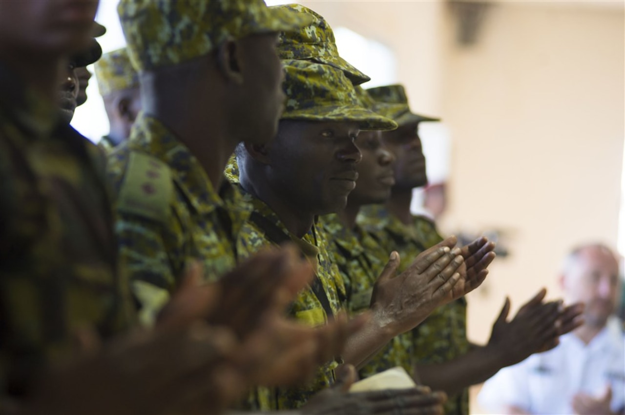 Ugandan Marines attend the closing ceremony for exercise Cutlass Express 2017 at the Djibouti Coast Guard base, Feb. 8, 2017. Exercise Cutlass Express 2017, sponsored by U.S. Africa Command and conducted by U.S. Naval Forces Africa, is designed to assess and improve combined maritime law enforcement capacity and promote national and regional security in East Africa. U.S. Navy photo by Petty Officer 3rd Class Robert Price