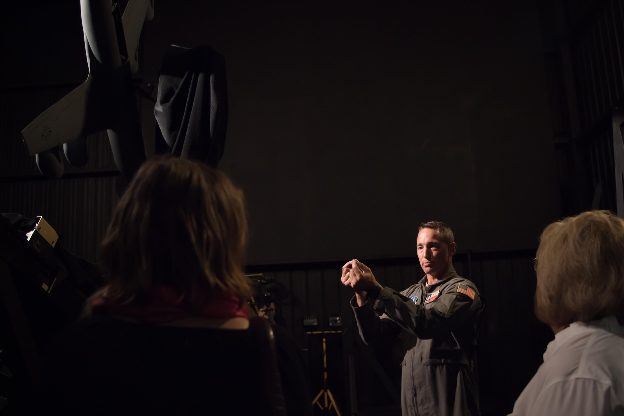 Senior Master Sgt. Tony Wilks, 733rd Training Squadron instructor, explains a C-5M Super Galaxy aircraft training simulator to Gulf Coast civic leaders during a 403rd Wing hosted civic leader tour at Joint Base San Antonio, March 23-24. (U.S. Air Force photo/Staff Sgt. Heather Heiney)