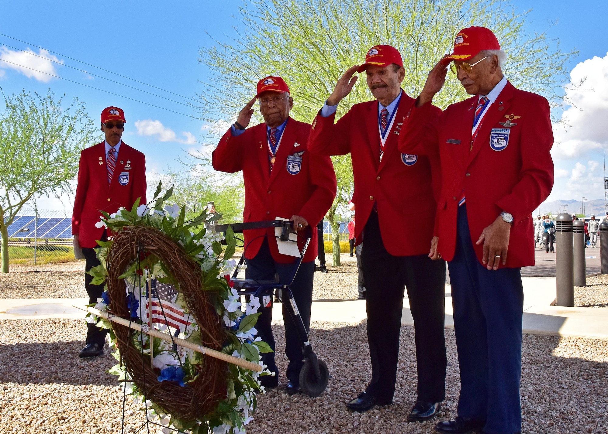 (Ret.) Lt. Col. Asa Herring, (Ret.) Tech. Sgt. Rudolf Silas, and (Ret.) Lt. Col. Robert Ashby, three of the original Tuskegee Airmen, render a salute Mar. 23 during the fourth annual Commemoration Day for the Tuskegee Airmen in Arizona at Luke Air Force Base, Ariz. (U.S. Air Force photo by Tech. Sgt. Louis Vega Jr.)