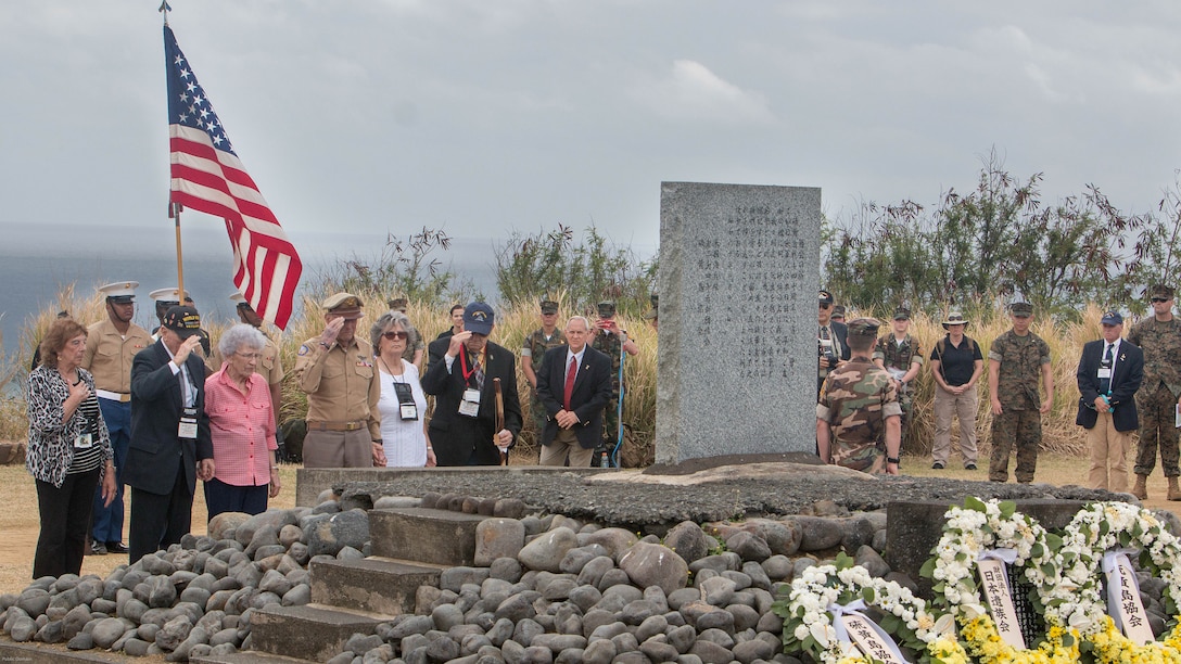 World War II veterans salute a memorial after placing a wreath at the base during a wreath-laying presentation as part of the 72nd Reunion of Honor ceremony on Iwo To, Japan March 25, 2017. The event presented the opportunity for the U.S. and Japanese people to mutually remember and honor thousands of service members who fought and died on the hallowed grounds of Iwo Jima.