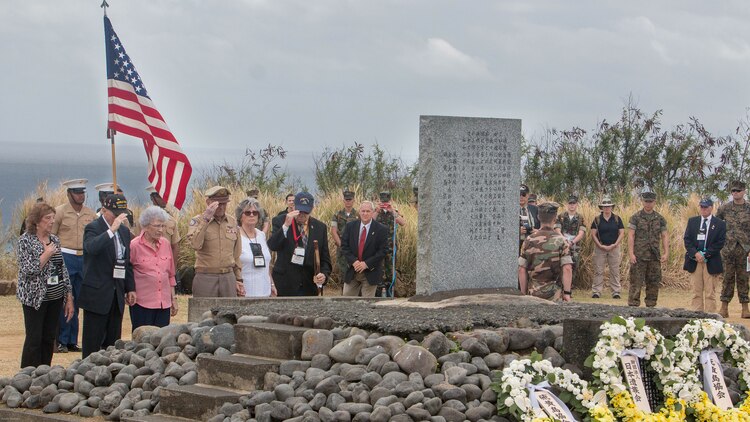 World War II veterans salute a memorial after placing a wreath at the base during a wreath-laying presentation as part of the 72nd Reunion of Honor ceremony on Iwo To, Japan March 25, 2017. The event presented the opportunity for the U.S. and Japanese people to mutually remember and honor thousands of service members who fought and died on the hallowed grounds of Iwo Jima.