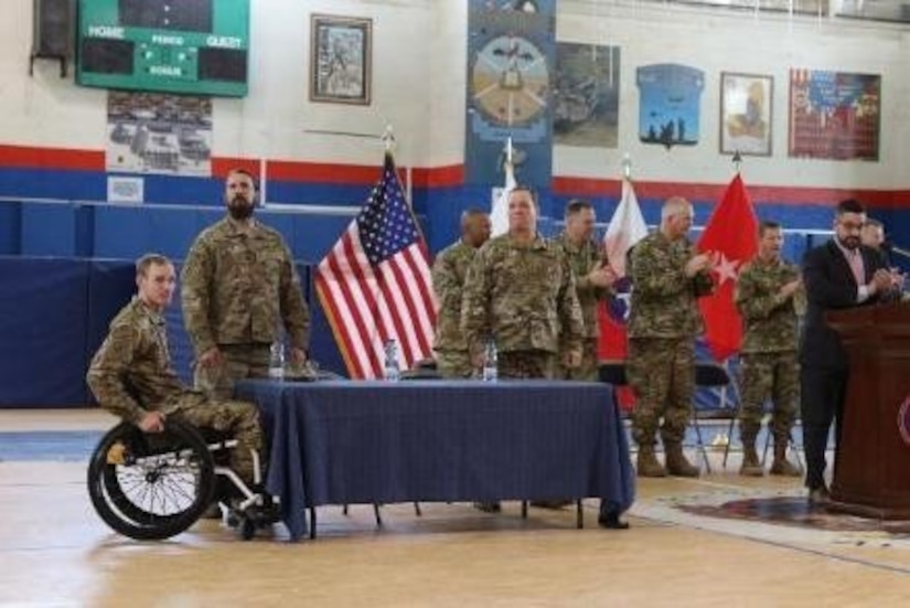 Soldiers of Operation Proper Exit are introduced in a town hall meeting, March 14, 2017, at Camp Arifjan, Kuwait. These U.S. Army Veterans are given a chance to return to the battlefield and depart on their own terms, which is an important part of heeling.