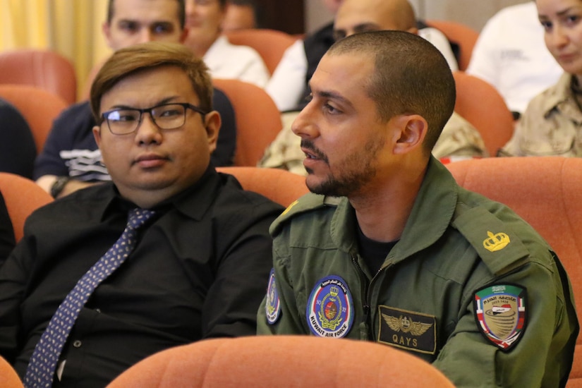 Kuwaiti Air Force Maj. Qays Al-Haider, an SA330 Puma helicopter pilot, asks about a procedure regarding medical evacuations during a Medical Evacuation meeting hosted, for the first time, at the Kuwait Armed Forces Hospital, March 5. This meeting is one of many partnership events that U.S. Soldiers, Airmen and Kuwaiti soldiers and airmen participate in together.