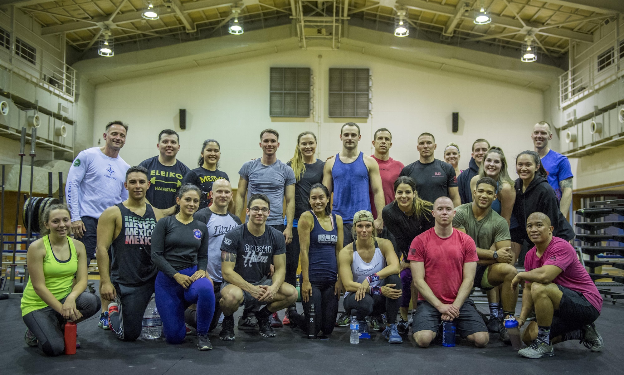 The participants pose for photo with coaches during the LifeFit Tour exercise demonstration March 21, 2017, at Yokota Air Base, Japan. The event held a morning and evening class and had over 40 people to participants. (U.S. Air Force photo by Airman 1st Class Donald Hudson)