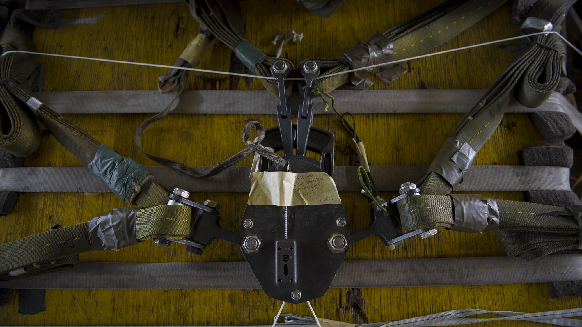 Rigging on a heavy equipment pallet sits before being loaded into a C-130J Super Hercules during a cargo drop training exercise March 20, 2017, at Yokota Air Base, Japan. The exercise included a small cargo load to simulate supplying food, water or ammunition, and a heavy cargo load to simulate vehicle delivery to combat or contingency operations. (U.S. Air Force photo by Airman 1st Class Donald Hudson)