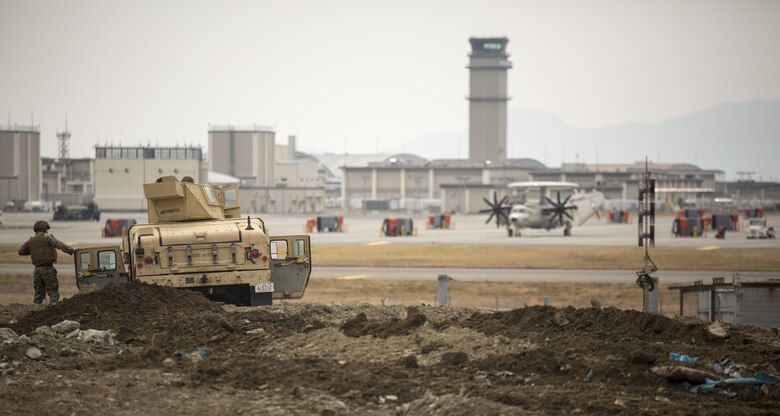 U.S. Marine Corps John M. Barraca, a motor transport operator with Marine Wing Support Squadron (MWSS) 171, participates in exercise Tanuki Wrath on Marine Corps Air Station Iwakuni, Japan, March 22, 2017. MWSS-171 conducted exercise Tanuki Wrath to help train Marines to set up security around a downed aircraft and how to control a riot. (U.S. Marine Corps photo by Lance Cpl. Jacob A. Farbo)