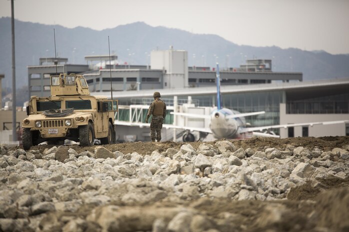 U.S. Marine Corps Marine Wing Support Squadron (MWSS) 171 conducted exercise Tanuki Wrath on Marine Corps Air Station Iwakuni, Japan, March 22, 2017. MWSS-171 conducted the exercise to help train Marines to set up security around a downed aircraft and how to control a riot. (U.S. Marine Corps photo by Lance Cpl. Jacob A. Farbo)