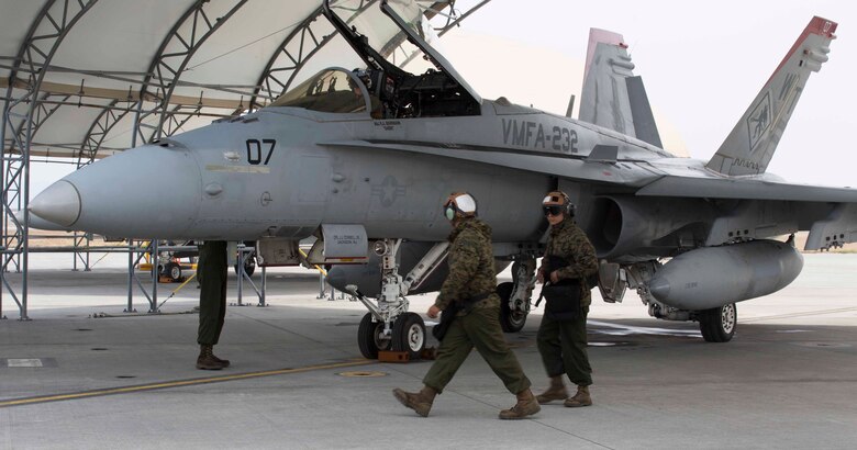 U.S. Marines with Marine Fighter Attack Squadron (VMFA) 232 prepare an F/A-18C Hornet aircraft for safe flight at Marine Corps Air Station (MCAS) Iwakuni, Japan, March 22, 2017. The squadron left MCAS Miramar, Calif., March 11, 2017 and arrived at MCAS Iwakuni March 15. The squadron is part of the Unit Deployment Program and helps provide air support to III Marine Expeditionary Force through training and combat operations. (U.S. Marine Corps photo by Lance Cpl. Gabriela Garcia-Herrera)