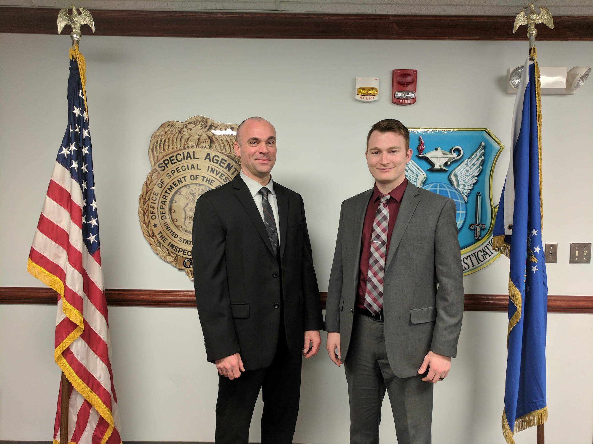 Special Agents Matthew Heckman, left, and Nicolas Finn of the Major Crimes Branch, Air Force Office of Special Investigations, in Bldg. 70, Area A, work to uncover cases of fraudulent activity usually amounting to $10,000 or more at Wright-Patterson Air Force Base. (Courtesy photo)
