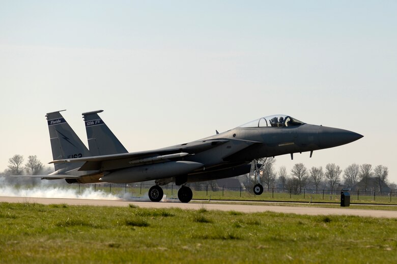 An F-15C Eagle crew chief performs maintenance at Leeuwarden Air Base, Netherlands, March 24, 2017. F-15C's from the Lousiana and Florida Air National Guard's 159th Expeditionary Fighter Squadron deployed to Europe to participate in a Theater Security Package. These F-15s will conduct training alongside NATO allies to strengthen interoperability and to demonstrate U.S. commitment to the security and stability of Europe. (U.S. Air Force photo by Tech. Sgt. Staci Miller)


	
