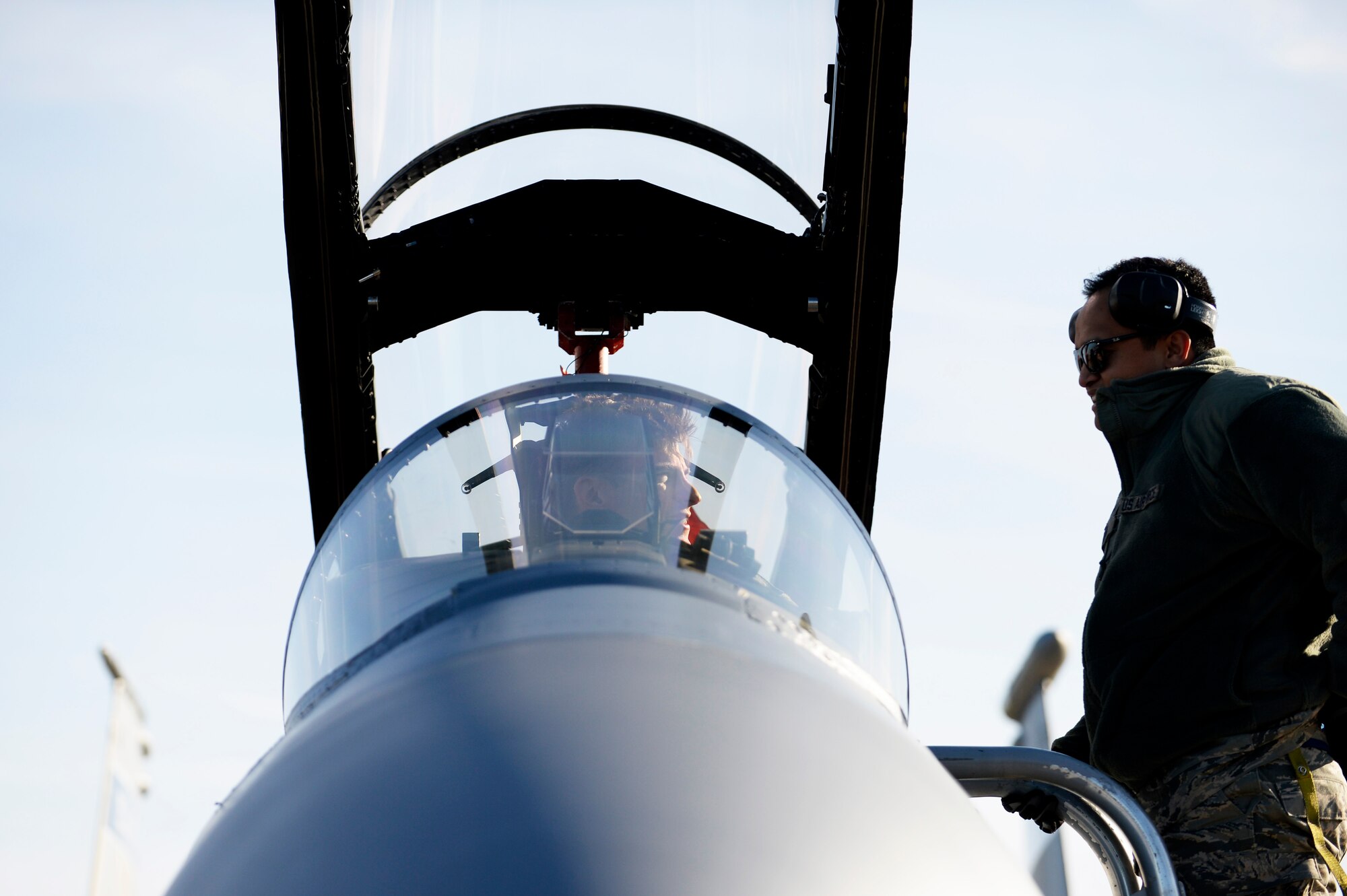 An F-15C Eagle pilot talks with his crew chief after landing at Leeuwarden Air Base, Netherlands, March 24, 2017. F-15C's from the Lousiana and Florida Air National Guard's 159th Expeditionary Fighter Squadron deployed to Europe to participate in a Theater Security Package. These F-15s will conduct training alongside NATO allies to strengthen interoperability and to demonstrate U.S. commitment to the security and stability of Europe. (U.S. Air Force photo by Tech. Sgt. Staci Miller)
	

	
