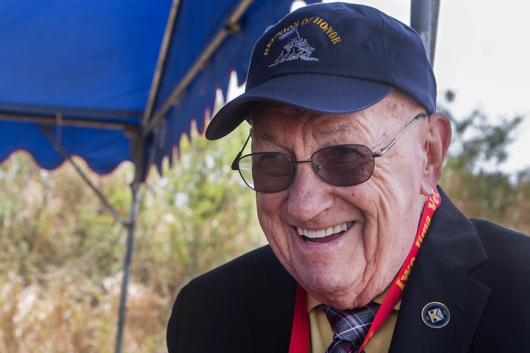 Iwo Jima veteran Francis Jackson shares a moment with other veterans participating in the 72nd anniversary of the Battle of Iwo Jima at the Reunion of Honor memorial in Iwo To, Japan, March 25, 2017. Jackson was one of eight veterans in attendance alongside American and Japanese distinguished guests, both military and civilian. Marine Corps photo by Staff Sgt. Valerie Eppler