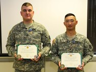 U.S. Army Reserve Staff Sgt. Brandon Coffey and Spc. Benjamin Zachary, combat engineers with 366th Engineer Company, 412th Theater Engineer Command, earned a distinguished rating with a score of 992 out of 1,000 during Operation Cold Steel at Fort McCoy, Wis., March 25, 2017. Coffey and Zachary have scored the highest in gunnery since the exercise began March 8. Operation Cold Steel is the U.S. Army Reserve's crew-served weapons qualification and validation exercise to ensure that America's Army Reserve units and Soldiers are trained and ready to deploy on short-notice and bring combat-ready and lethal firepower in support of the Army and our joint partners anywhere in the world. (U.S. Army Reserve photo by Staff Sgt. Debralee Best, 84th Training Command)
