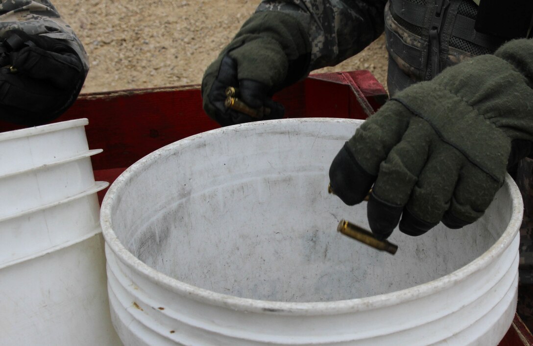 U.S. Army Reserve Staff Sgt. Jason Kelly with 366th Engineer Company, 412th Theater Engineer Command, receives ammunition for zero in preparation for completion of live-fire qualification during Operation Cold Steel at Fort McCoy, Wis., March 23, 2017. Operation Cold Steel is the U.S. Army Reserve's crew-served weapons qualification and validation exercise to ensure that America's Army Reserve units and Soldiers are trained and ready to deploy on short-notice and bring combat-ready and lethal firepower in support of the Army and our joint partners anywhere in the world. (U.S. Army Reserve photo by Staff Sgt. Debralee Best, 84th Training Command)