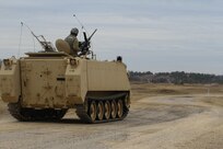 U.S. Army Reserve Staff Sgt. Jason Kelly with 366th Engineer Company, 412th Theater Engineer Command, receives ammunition for zero in preparation for completion of live-fire qualification during Operation Cold Steel at Fort McCoy, Wis., March 23, 2017. Operation Cold Steel is the U.S. Army Reserve's crew-served weapons qualification and validation exercise to ensure that America's Army Reserve units and Soldiers are trained and ready to deploy on short-notice and bring combat-ready and lethal firepower in support of the Army and our joint partners anywhere in the world. (U.S. Army Reserve photo by Staff Sgt. Debralee Best, 84th Training Command)