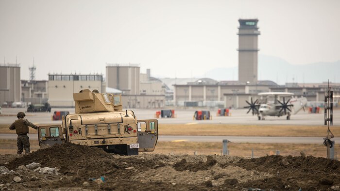 Sgt. John M. Barraca, a motor transport operator with Marine Wing Support Squadron 171, participates in exercise Tanuki Wrath on Marine Corps Air Station Iwakuni, Japan, March 22, 2017. MWSS-171 conducted exercise Tanuki Wrath to help train Marines to set up security around a downed aircraft and how to control a riot. 