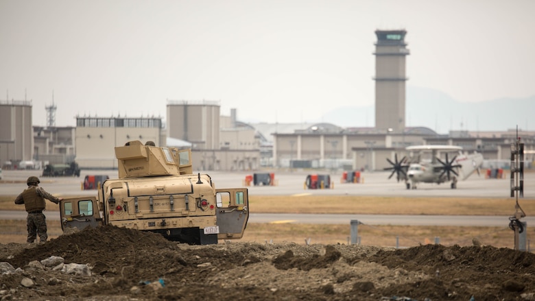 Sgt. John M. Barraca, a motor transport operator with Marine Wing Support Squadron 171, participates in exercise Tanuki Wrath on Marine Corps Air Station Iwakuni, Japan, March 22, 2017. MWSS-171 conducted exercise Tanuki Wrath to help train Marines to set up security around a downed aircraft and how to control a riot. 