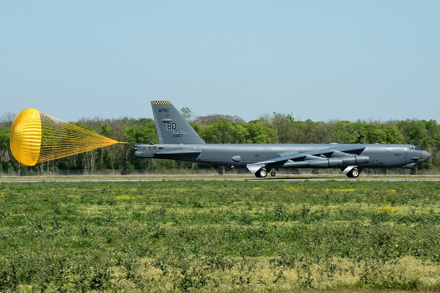 An Air Force Reserve Command B-52H Stratofortress assigned to the 307th Bomb Wing deploys its drag chute after landing on Mar. 23, 2017, Barksdale Air Force Base, La. It was shots like these that three photojournalists from the Netherlands representing Recce Reports were able to get during their one-day visit to Barksdale. (U.S. Air Force photo by Master Sgt. Greg Steele/Released)