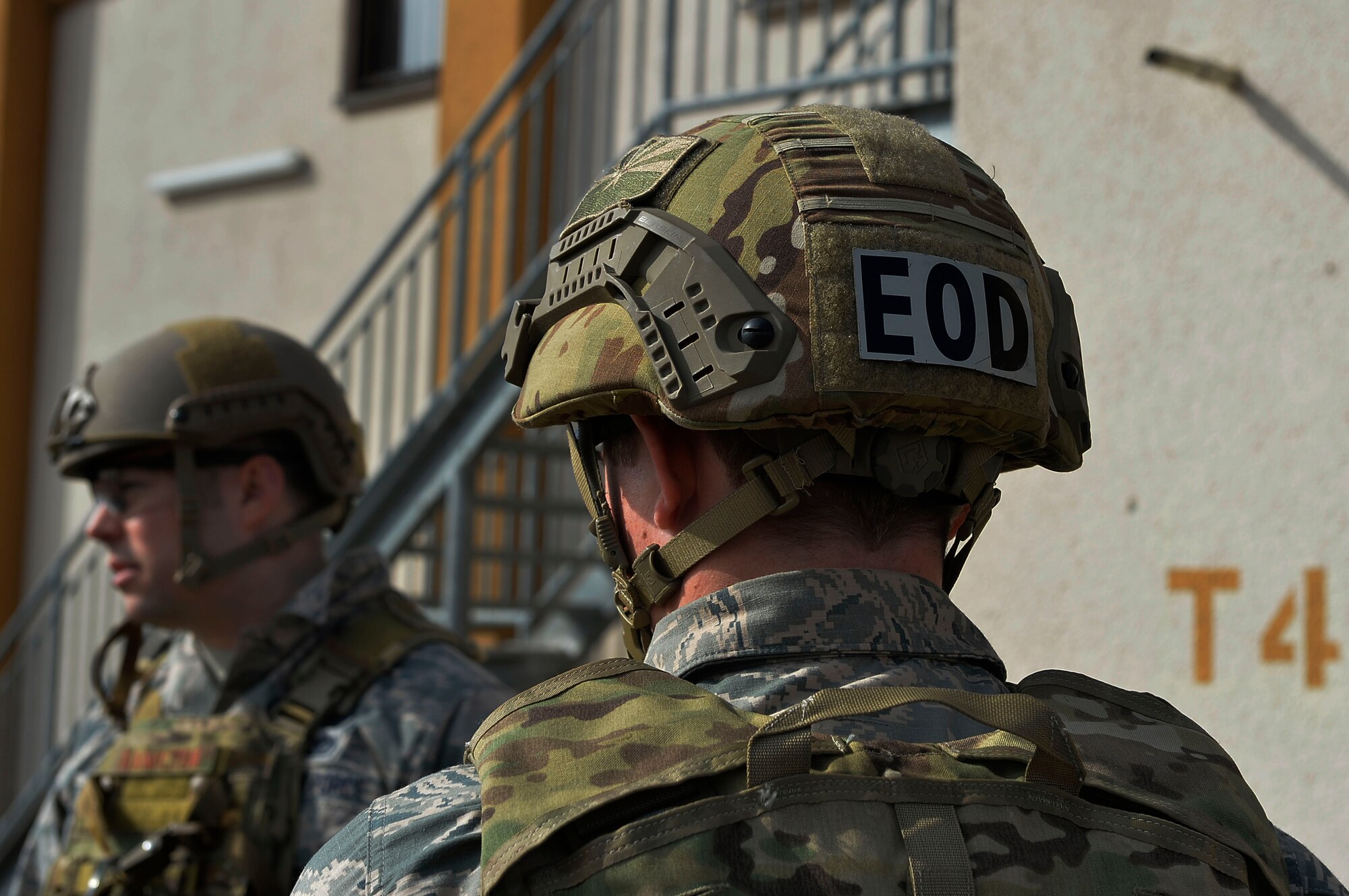 Explosive Ordnance Airmen prepare to perform a clearing operation at a building during an exercise on Ramstein Air Base, Germany March 23, 2017. EOD Airmen from different U.S. air bases around Germany participated in Exercise Silver Flag, which aims to enhance mission readiness in contingency Airmen. Exercise Silver flag is held (how many times a year) (U.S. Air Force photo by Airman 1st Class Joshua Magbanua) 


