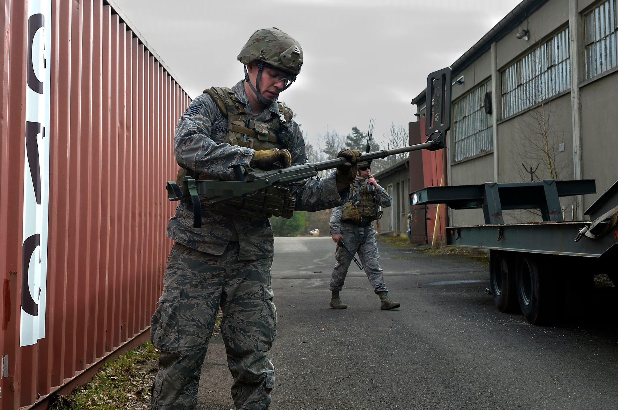Staff Sgt. Sam Reardon, 52nd Civil Engineer Squadron explosive ordnance disposal craftsman, inspects his metal detector during an exercise on Ramstein Air Base, Germany, March 23, 2017. EOD Airmen use a variety of equipment when working in areas which potentially contain explosives. Exercise Silver Flag involved EOD Airmen from different U.S. air bases around Germany. (U.S. Air Force photo by Airman 1st Class Joshua Magbanua) 