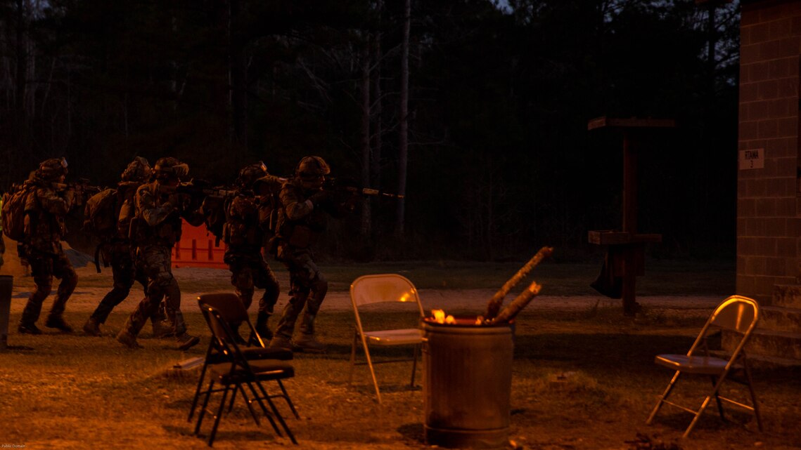 Dutch Marines prepare to breach a building while training with U.S. Marines with 2nd Reconnaissance Battalion, 2nd Marine Division, at Marine Corps Base Camp Lejeune, N.C., March 23, 2017. During the integrated training exercise, Dutch and U.S. Marines worked with canine units, coordinated air assets and exchanged tactics between services in order to strengthen cohesion and interoperability between the partner two allied nations. 