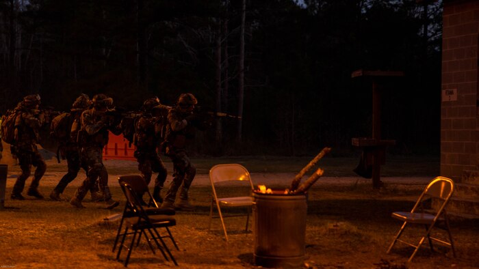 Dutch Marines prepare to breach a building while training with U.S. Marines with 2nd Reconnaissance Battalion, 2nd Marine Division, at Marine Corps Base Camp Lejeune, N.C., March 23, 2017. During the integrated training exercise, Dutch and U.S. Marines worked with canine units, coordinated air assets and exchanged tactics between services in order to strengthen cohesion and interoperability between the partner two allied nations. 
