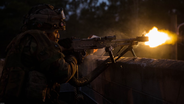 A Dutch Marine provides suppressive fire with a M240B machine gun while training with U.S. Marines with 2nd Reconnaissance Battalion, 2nd Marine Division, during a Military Operation in Urban Terrain exercise at Marine Corps Base Camp Lejeune, N.C., March 23, 2017. During the integrated training exercise, Dutch and U.S. Marines worked with canine units, coordinated air assets and exchanged tactics between services in order to strengthen cohesion and interoperability between the partner two allied nations. 