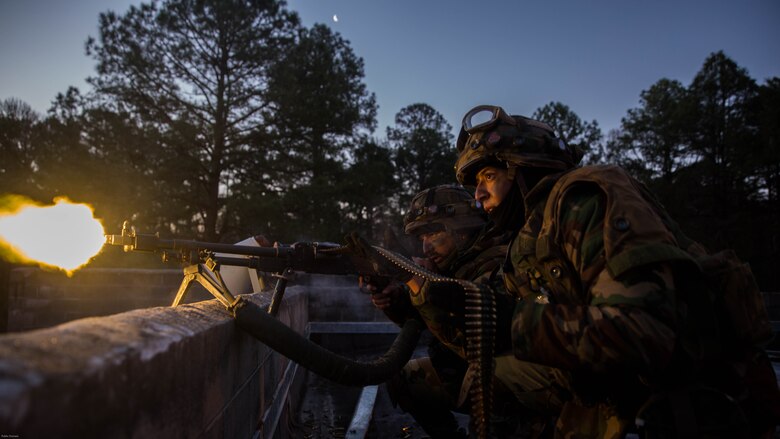 Dutch Marines provide suppressive fire with a M240B machine while training with U.S. Marines with 2nd Reconnaissance Battalion, 2nd Marine Division, during a Military Operation in Urban Terrain exercise at Marine Corps Base Camp Lejeune, N.C., March 23, 2017. During the integrated training exercise, Dutch and U.S. Marines worked with canine units, coordinated air assets and exchanged tactics between services in order to strengthen cohesion and interoperability between the partner two allied nations. 