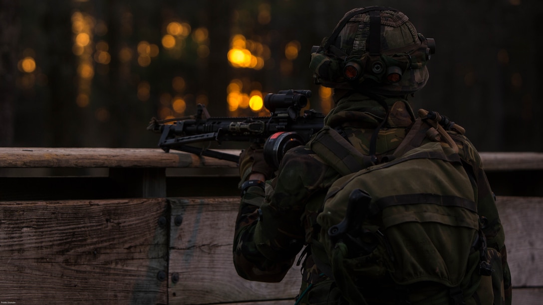 A Dutch Marine provides security with his Colt Canadian C7A3 carbine rifle while training with U.S. Marines with 2nd Reconnaissance Battalion, 2nd Marine Division, during a Military Operation in Urban Terrain exercise at Marine Corps Base Camp Lejeune, N.C., March 23, 2017. During the integrated training exercise, Dutch and U.S. Marines worked with canine units, coordinated air assets and exchanged tactics between services in order to strengthen cohesion and interoperability between the partner two allied nations. 