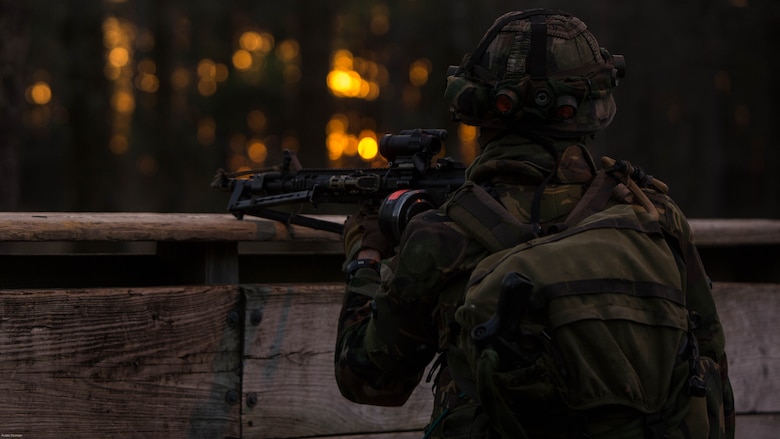 A Dutch Marine provides security with his Colt Canadian C7A3 carbine rifle while training with U.S. Marines with 2nd Reconnaissance Battalion, 2nd Marine Division, during a Military Operation in Urban Terrain exercise at Marine Corps Base Camp Lejeune, N.C., March 23, 2017. During the integrated training exercise, Dutch and U.S. Marines worked with canine units, coordinated air assets and exchanged tactics between services in order to strengthen cohesion and interoperability between the partner two allied nations. 
