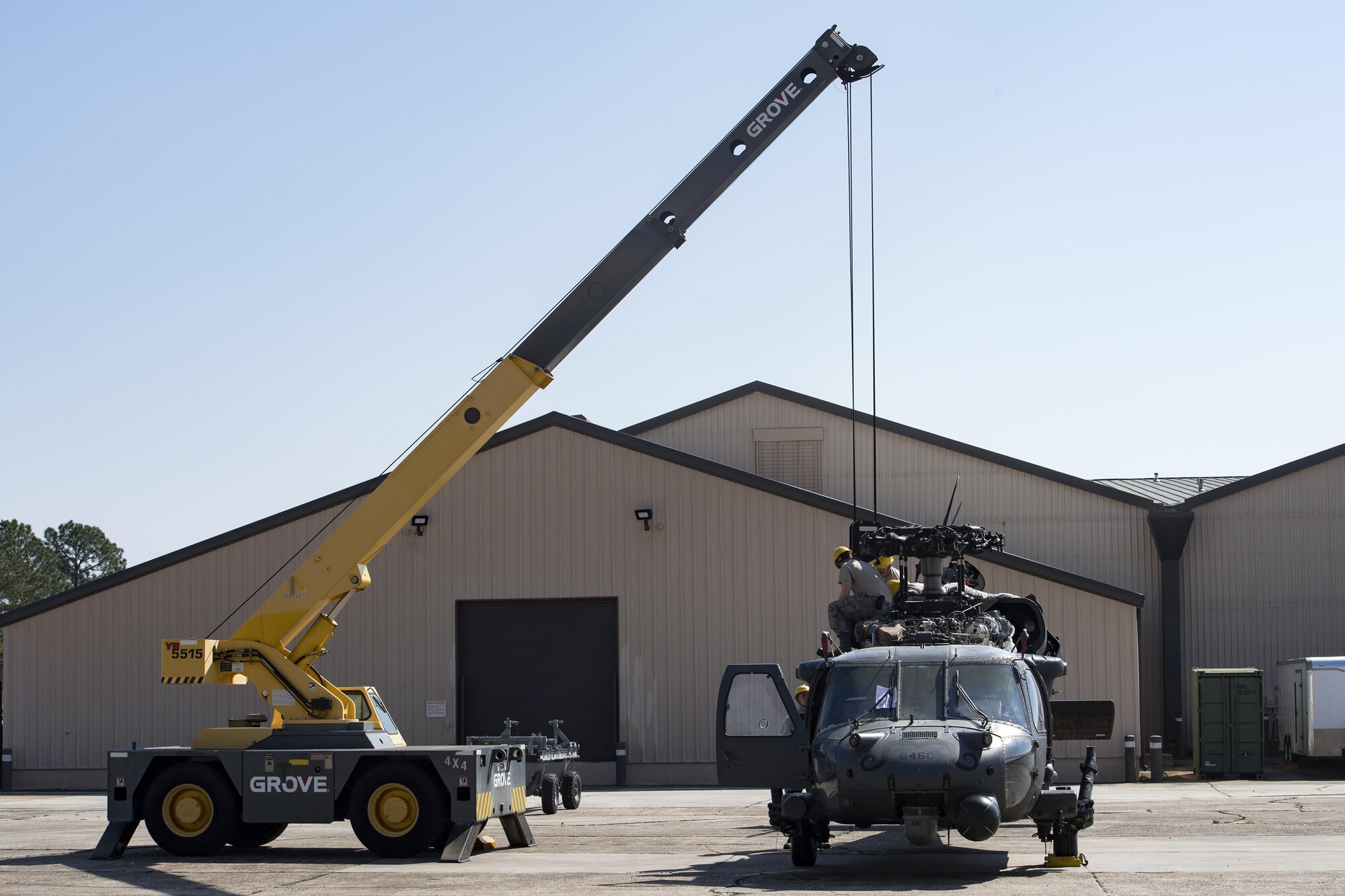 Airmen from the 41st Helicopter Maintenance Unit install an engine to a HH-60G Pave Hawk, March 22, 2017, at Moody Air Force Base, Ga. The 41st HMU is responsible for Moody’s Pave Hawk fleet. Through innovation and preventative maintenance, they ensure each of their 13 Pave Hawks receive the upkeep needed to accomplish the mission. (U.S. Air Force photo by Airman 1st Class Janiqua P. Robinson)