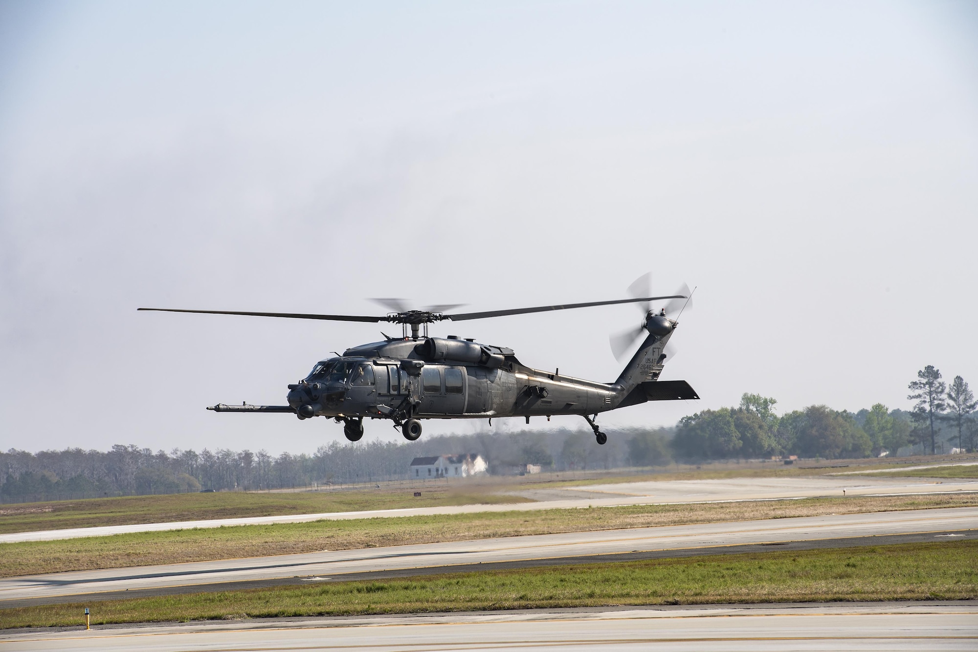 An HH-60G Pave Hawk hovers near the flightline, March 22, 2017, at Moody Air Force Base, Ga. The 41st HMU is responsible for Moody’s Pave Hawk fleet. Through innovation and preventative maintenance, they ensure each of their 13 Pave Hawks receive the upkeep needed to accomplish the mission. (U.S. Air Force photo by Airman 1st Class Janiqua P. Robinson)