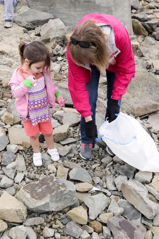 Volunteers pick up trash at Lake Eufaula as part of the bi-annual cleanup effort by the local organization Team Up to Clean Up.